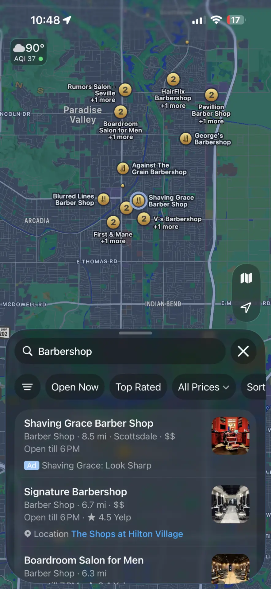 Apple Maps search for Barbershop showing Shaving Grace Barber Shop as a sponsored result with an Ad badge